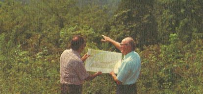 Surdex founder Earl R. Hoffmann looking at a map